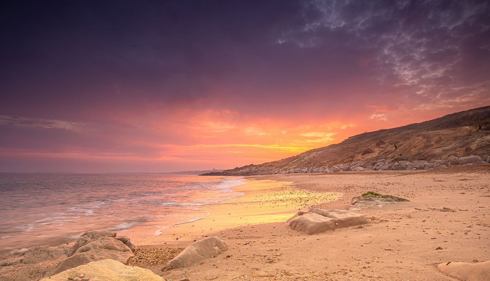 Sunset over Barton on Sea Beach